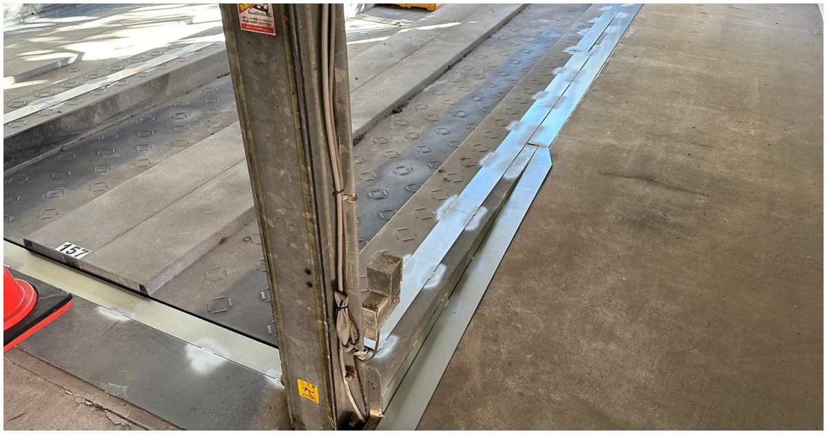 機械式駐車場の点検停止のリスクをイメージした画像